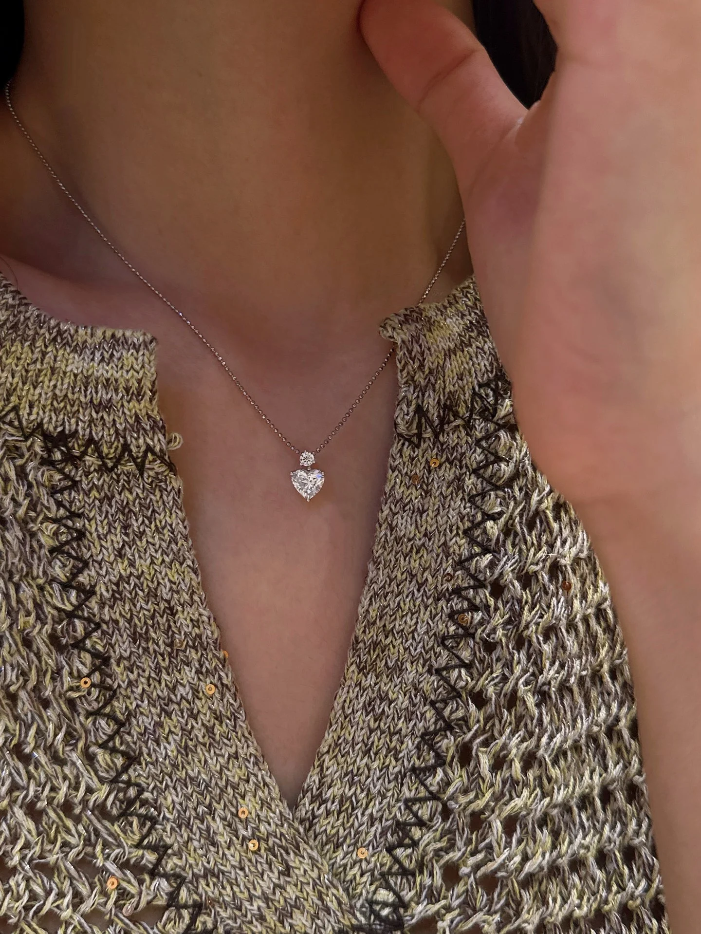 Heart pendant 001 · Worn at the neck (supplied photograph)