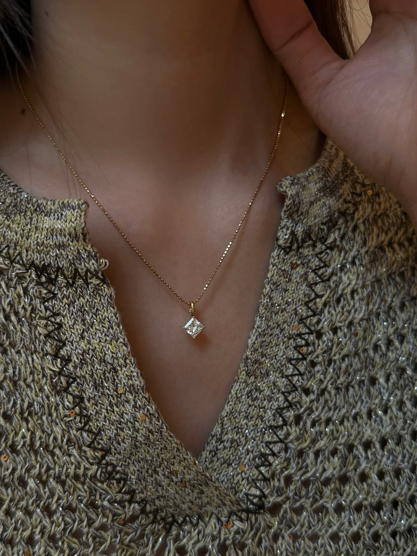 Square pendant 002 · Worn at the neck (supplied photograph)
